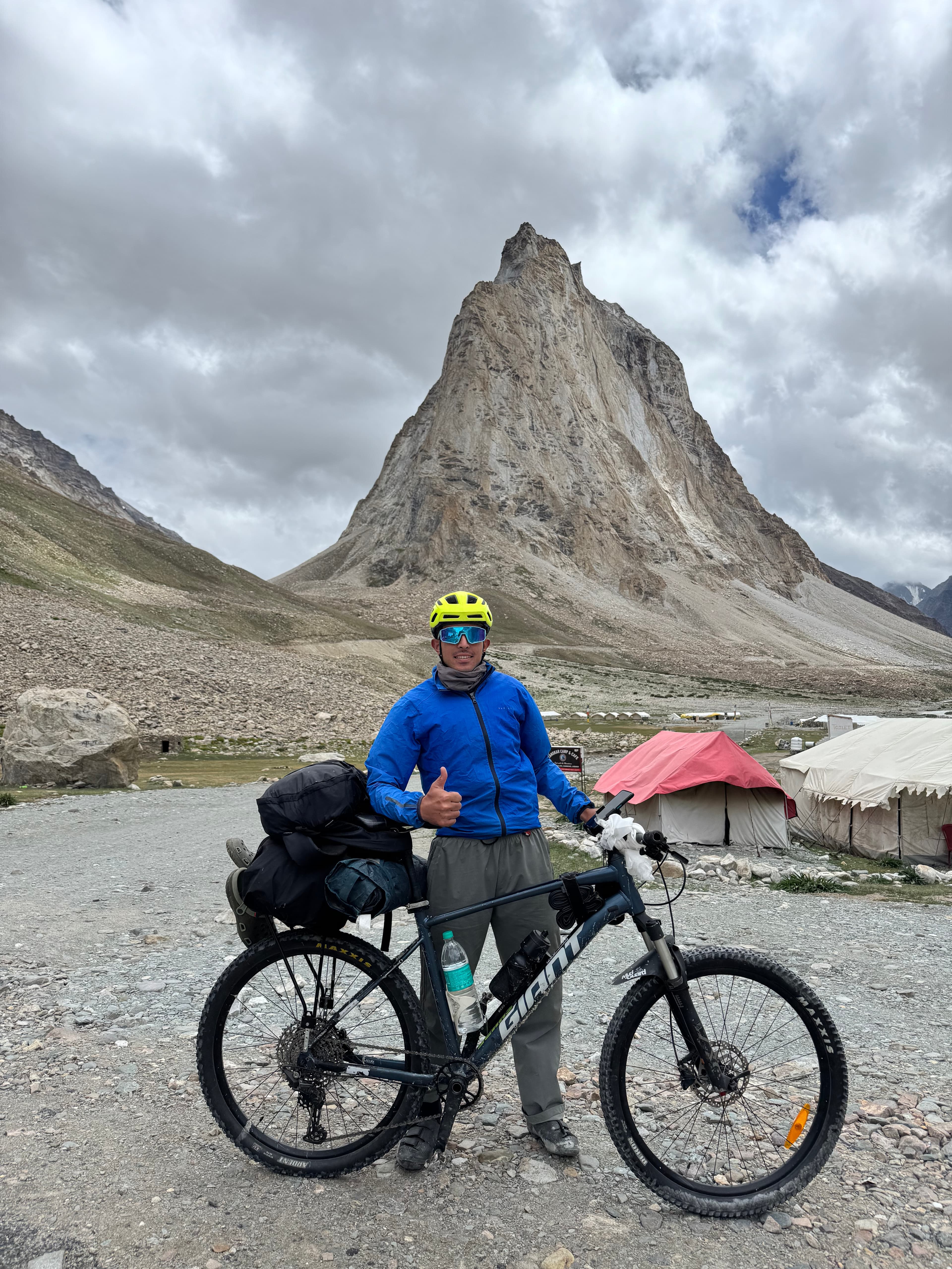 Atul Kumar welcoming guests on a trail above Dharamkot